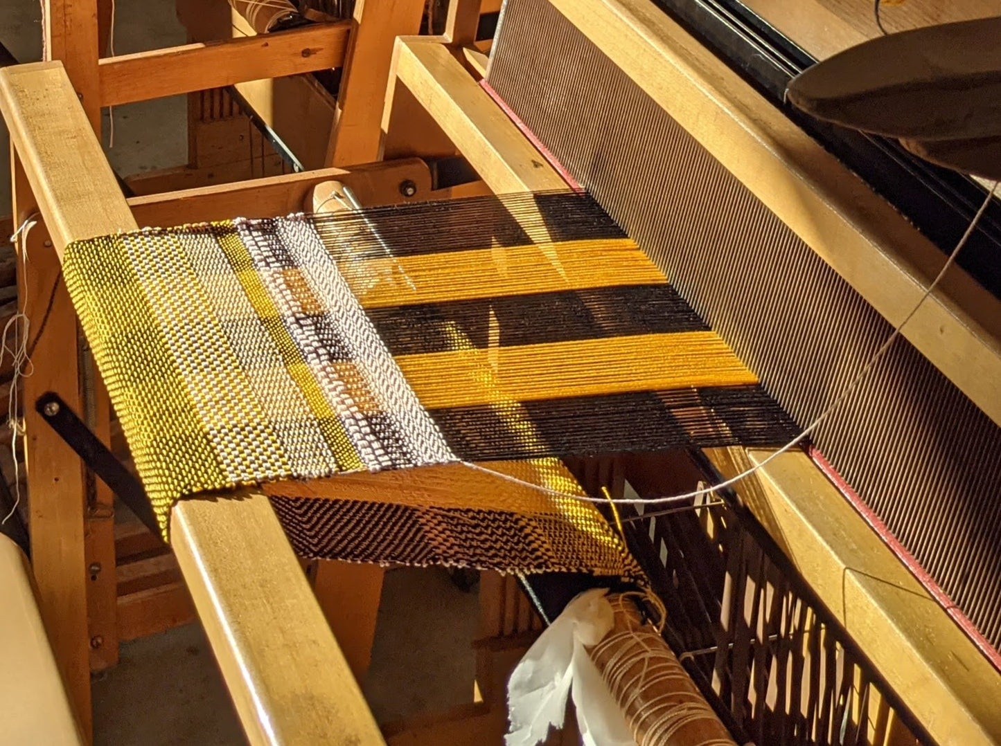 From Cone to Cloth: Beginner Weaving on a Floor Loom (March 22, 23 + 29)
